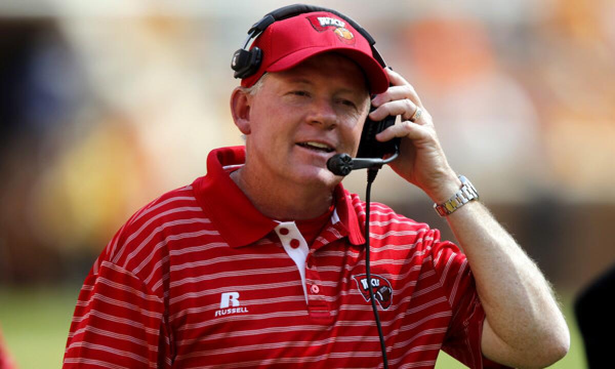Western Kentucky Coach and former Arkansas coach Bobby Petrino is expected to be named Louisville's new football coach on Thursday.