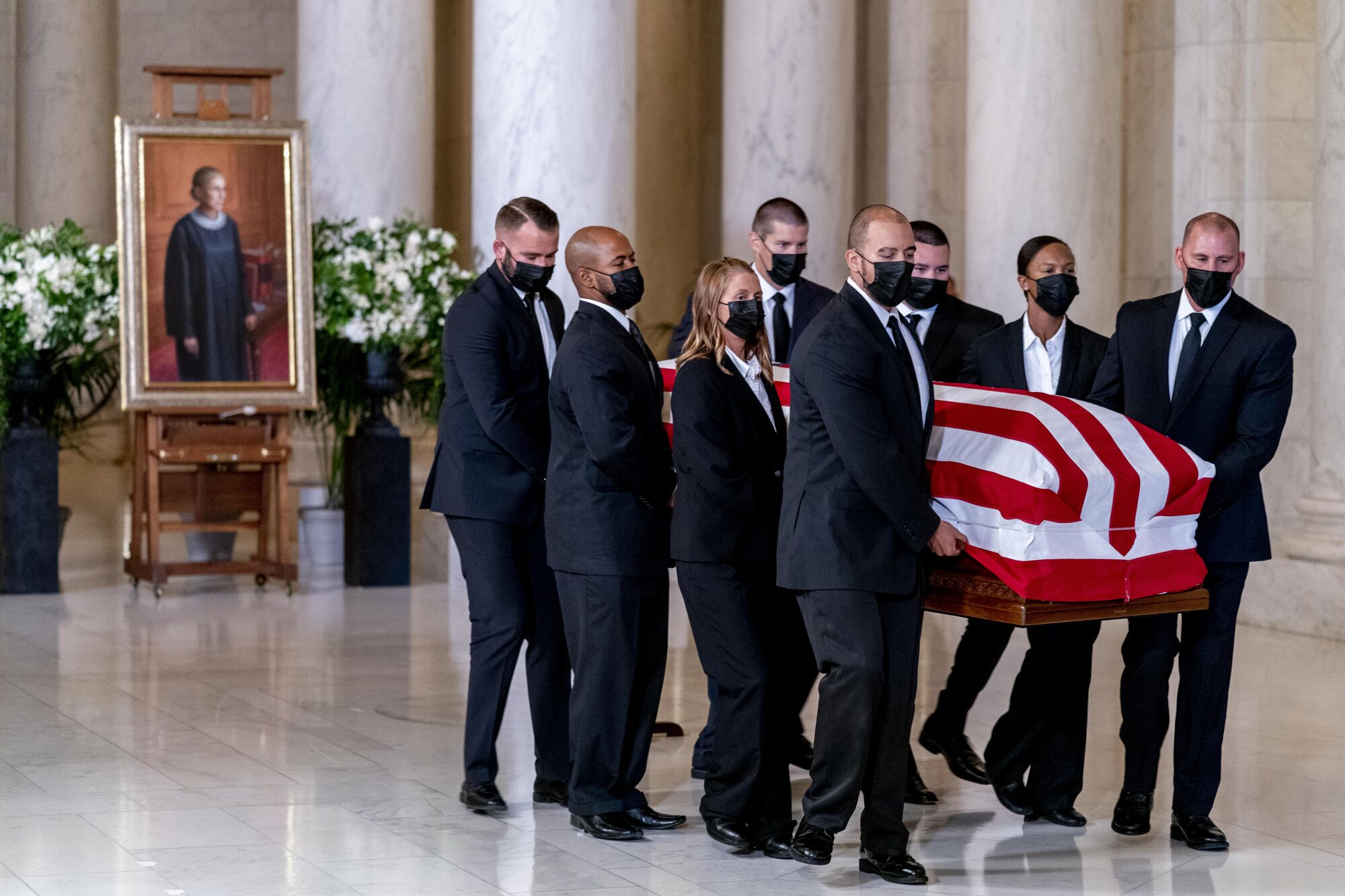 The flag-draped casket of Justice Ruth Bader Ginsburg