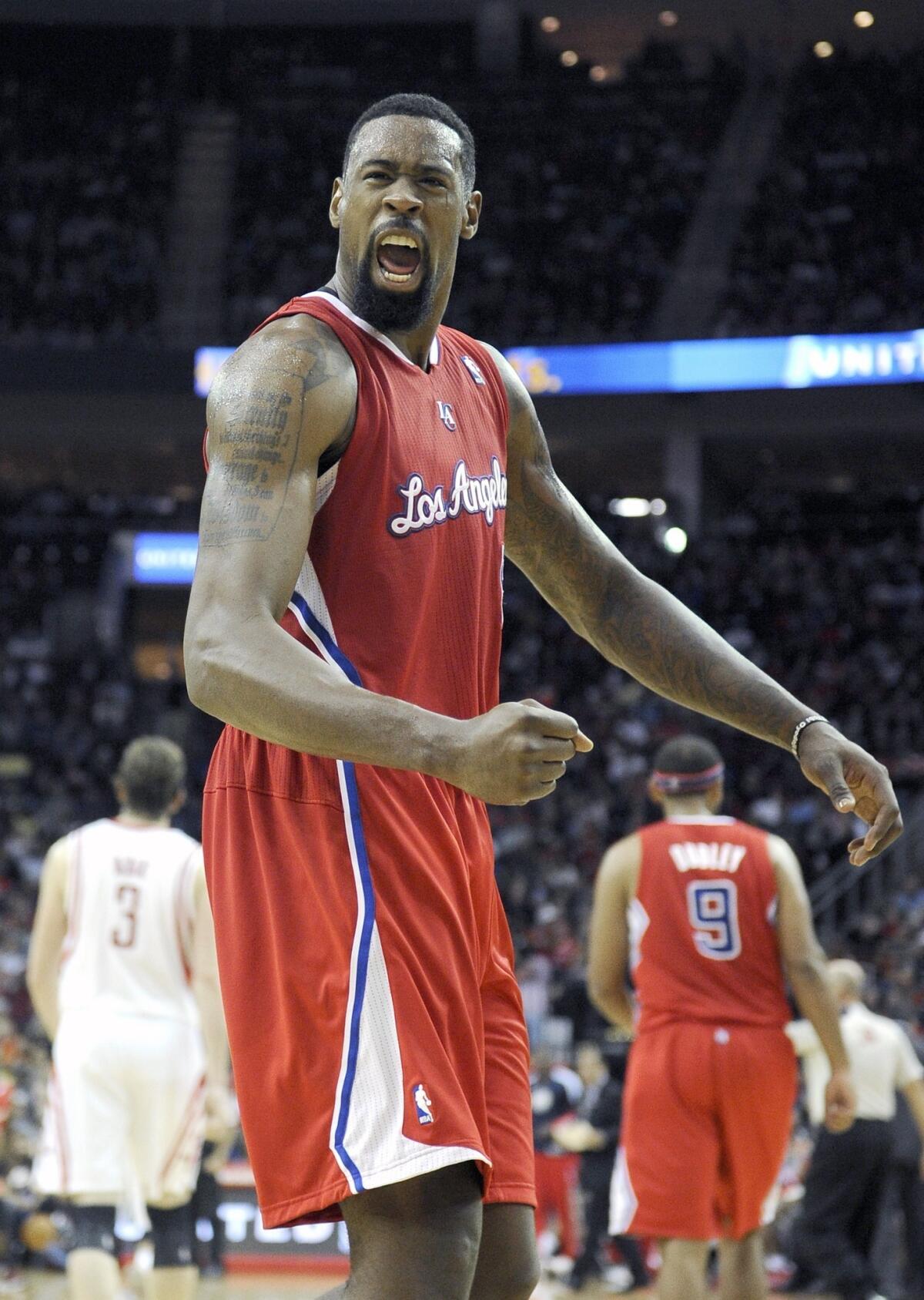 Clippers center DeAndre Jordan reacts after blocking a shot during Saturday's win over the Houston Rockets. Jordan has recorded 51 rebounds over the last three games.