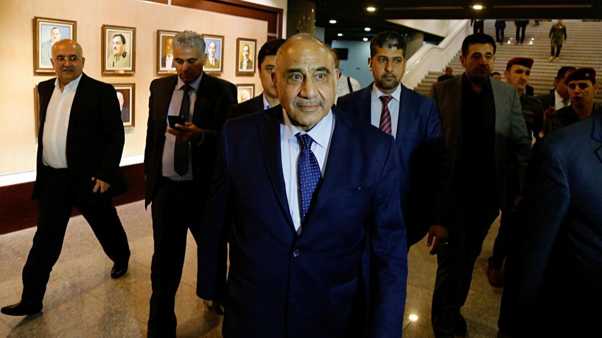 Iraq's new prime minister, Adel Abdul-Mahdi, leaves the parliament building in Baghdad on Oct. 2.