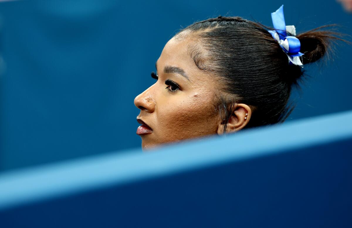 PARIS, FRANCE July 24, 2024-U.S. gymnast Jordan Chiles takes a break during podium training.