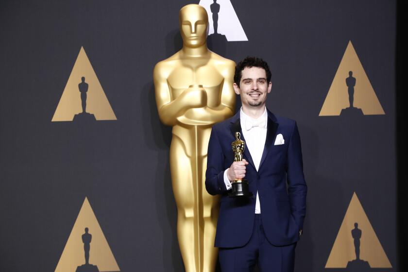 Academy Award-winning "La La Land" director Damien Chazelle poses during the 89th Academy Awards at the Dolby Theatre on Feb. 26, 2017.