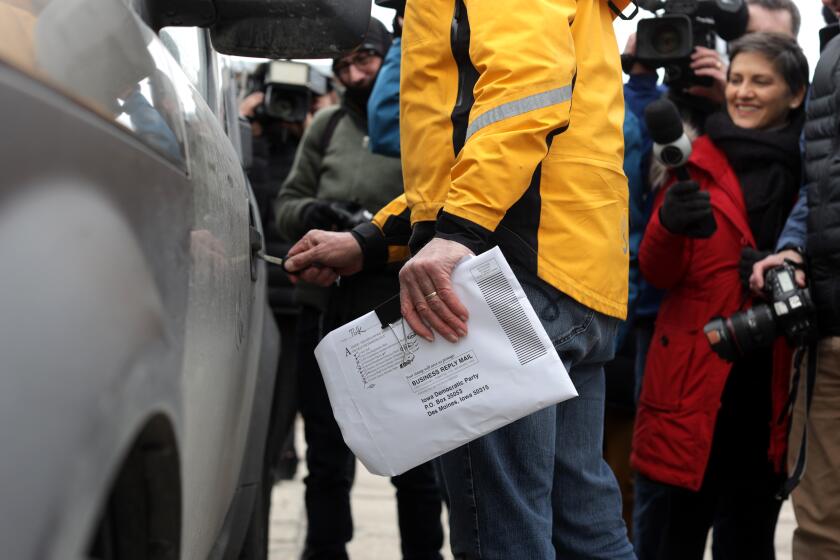 DES MOINES, IOWA - FEBRUARY 04: Carl Voss, Des Moines City Councilman and a precinct chair, returns to his car after he unsuccessfully attempted to drop off a caucus results packet from Precinct 55 at the Iowa Democratic Party headquarters February 4, 2020 in Des Moines, Iowa. The announcement of the results in the Iowa presidential caucuses have been delayed after inconsistencies were found late Monday night related to the app used to count the votes. The state Democratic Party said that the results will be manually verified before being released. (Photo by Alex Wong/Getty Images) ** OUTS - ELSENT, FPG, CM - OUTS * NM, PH, VA if sourced by CT, LA or MoD **