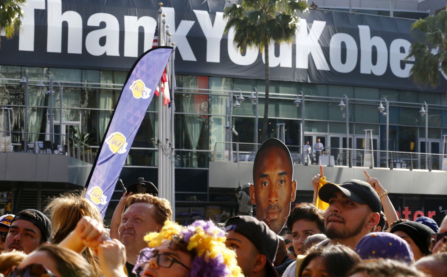 Fans gather outside Staples Center before Kobe Bryant's final game in a Laker uniform.