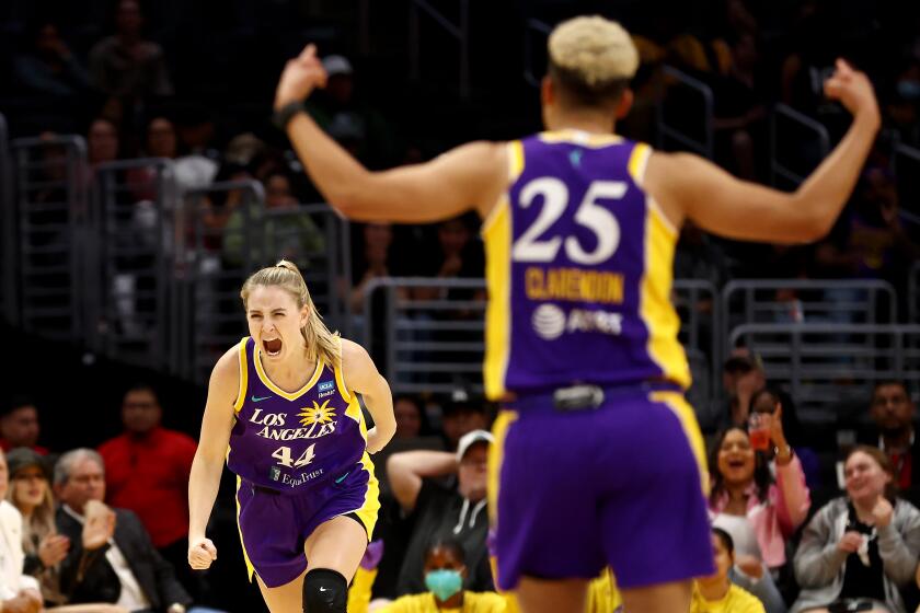 LOS ANGELES, CALIFORNIA - MAY 25: Karlie Samuelson #44 of the Los Angeles Sparks reacts after a three-point basket during the second quarter against the Las Vegas Aces at Crypto.com Arena on May 25, 2023 in Los Angeles, California. NOTE TO USER: User expressly acknowledges and agrees that, by downloading and or using this photograph, User is consenting to the terms and conditions of the Getty Images License Agreement. (Photo by Katelyn Mulcahy/Getty Images)