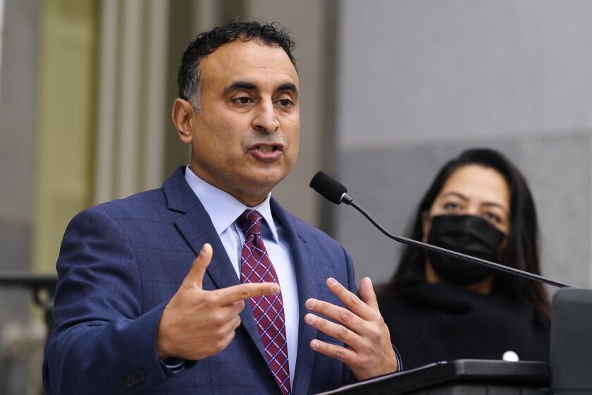 FILE - Assemblyman Ash Kalra, D-San Jose, talks during a news conference at the Capitol in Sacramento, Calif., Thursday, Jan. 6, 2022. On Monday, March 21, 2022, the California Assembly approved a bill that would eliminate "involuntary servitude" from the state Constitution as a permissible punishment for crime. Kalra, a Democrat from San Jose, spoke in favor of the bill, which would have to be approved by voters before it could take effect. (AP Photo/Rich Pedroncelli, File)