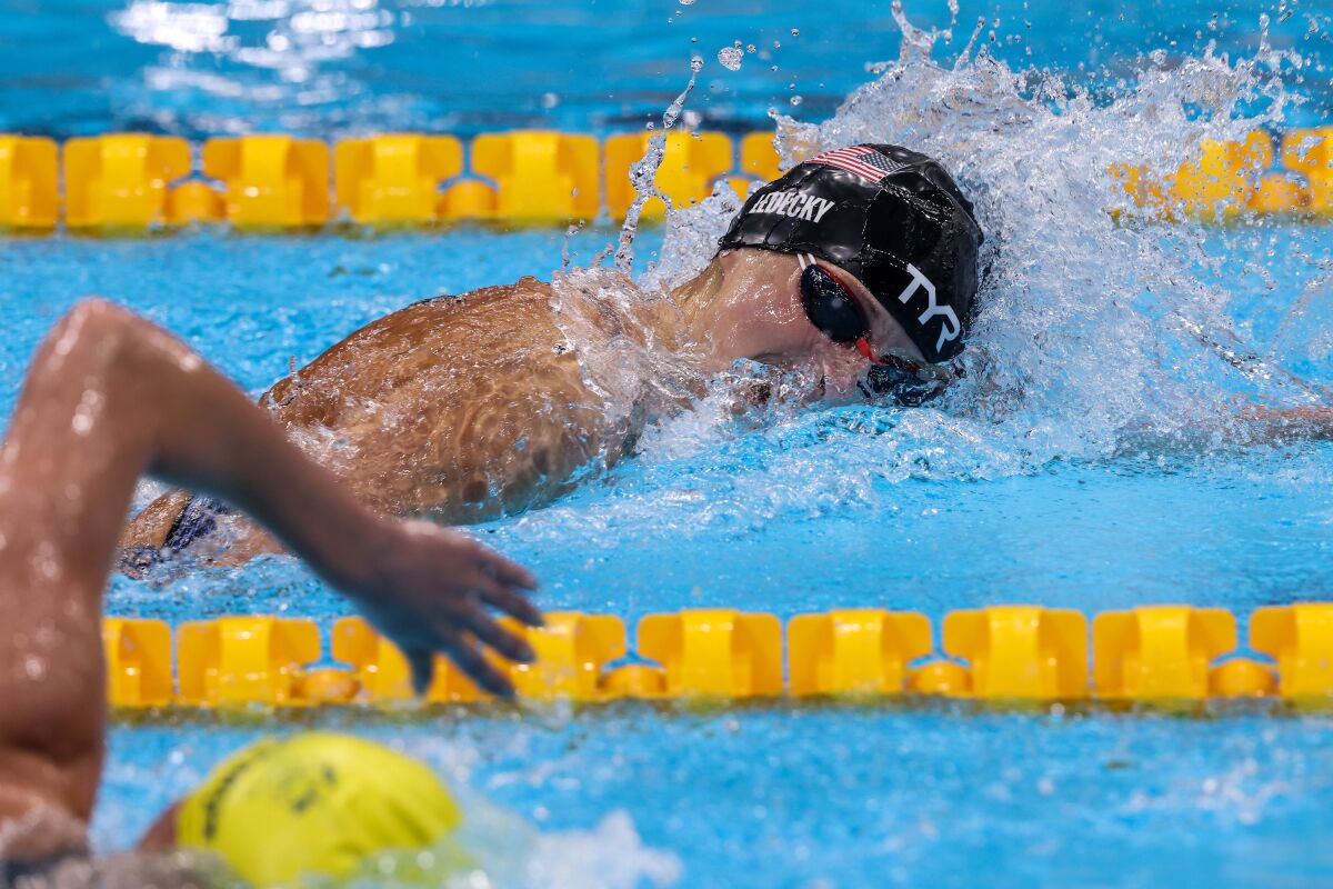 USA swimmer Katie Ledecky battles Australia's Ariarne Titmus