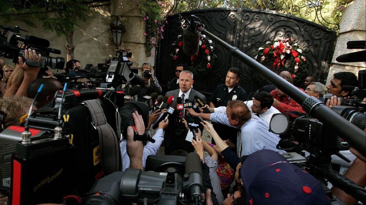 LAPD Lt. Greg Strenk holds a news conference in front of singer Michael Jackson's home on June 25, 2009.