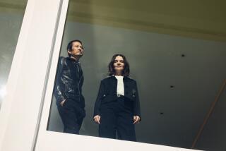 LOS ANGELES, CA - JANUARY 10, 2024: Actor Juliette Binoche and director Tran Anh Hung of the movie "The Taste of Things" pose for a portrait in Los Angeles on Wednesday, January 10, 2024. (Yuri Hasegawa / For The Times)