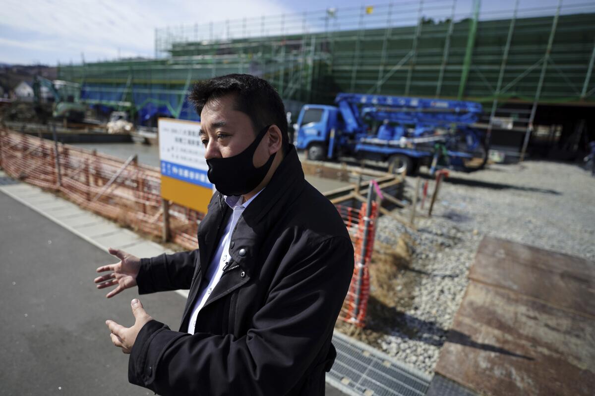 A masked man at a construction site