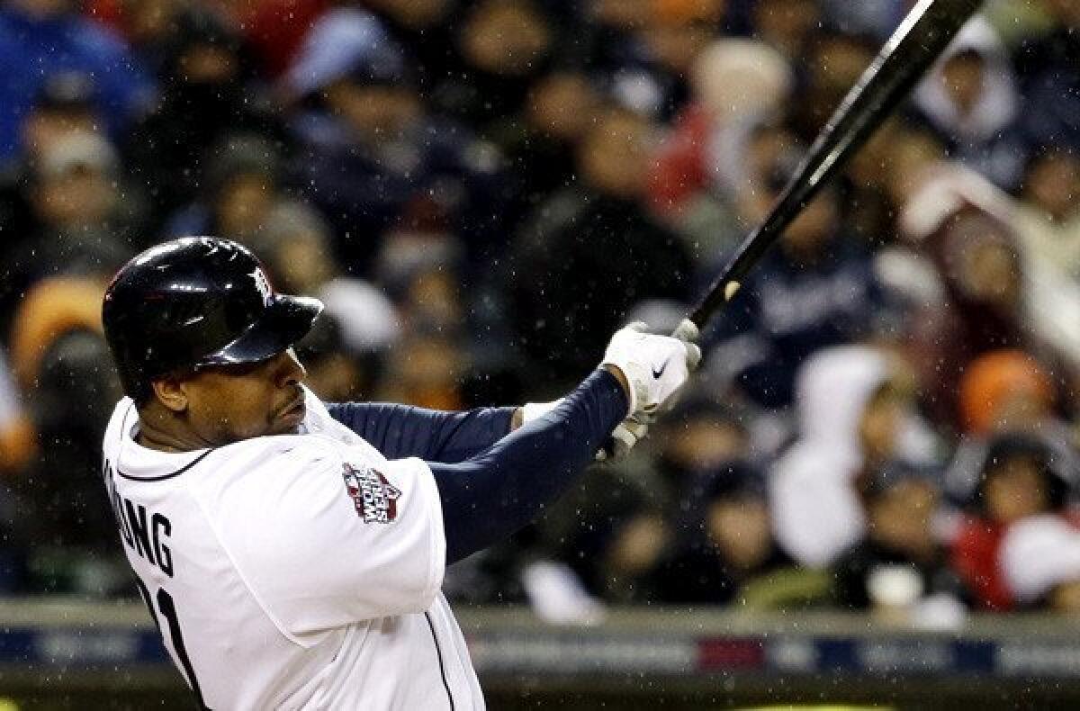 Tigers designated hitter Delmon Young hits a home run against the Giants in Game 4 of the World Series last month.