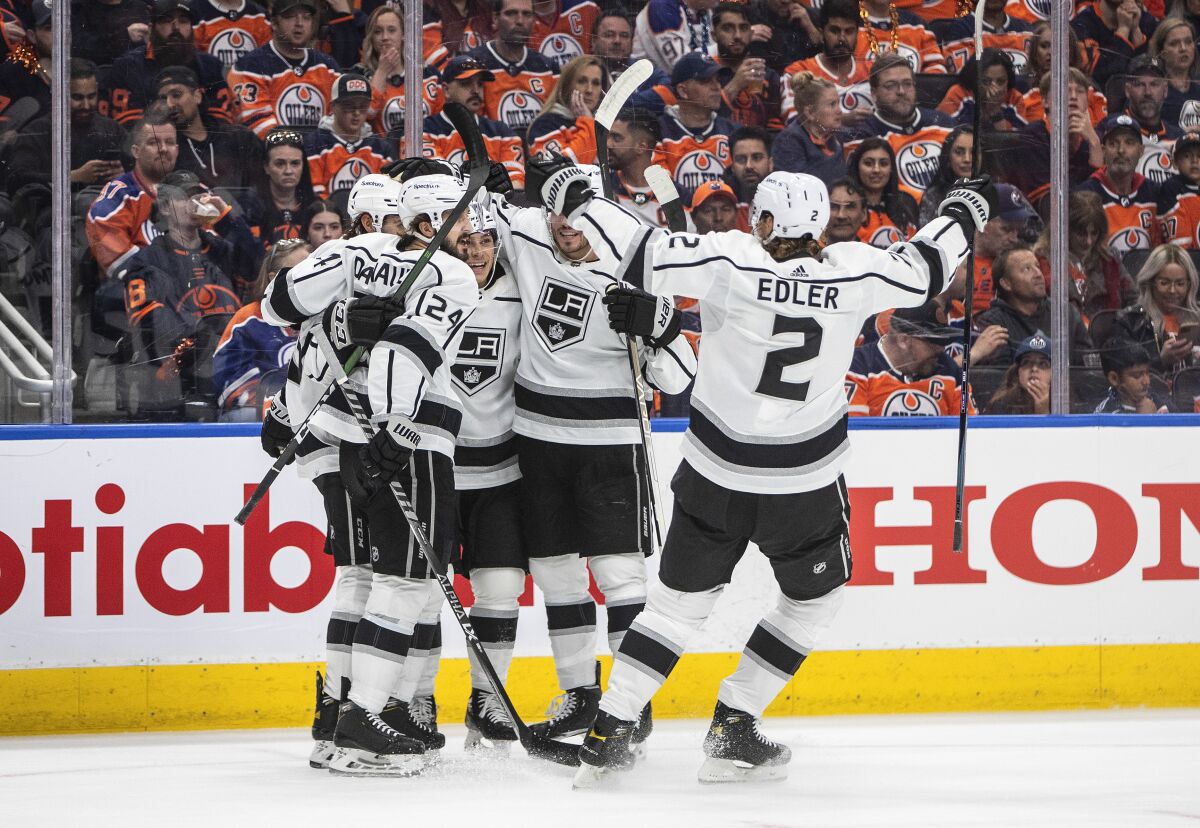 Los Angeles Kings celebrate a goal against the Edmonton Oilers during the first period of Game 1 of an NHL hockey Stanley Cup first-round playoff series, Monday, May 2, 2022 in Edmonton, Alberta. (Jason Franson/The Canadian Press via AP)