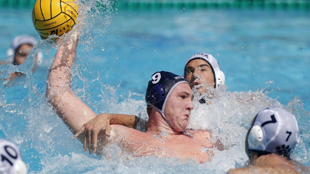 Newport Harbor High's Ike Love (9) scores against visiting Loyola during the first half of the South Coast Tournament semifinals on Saturday.