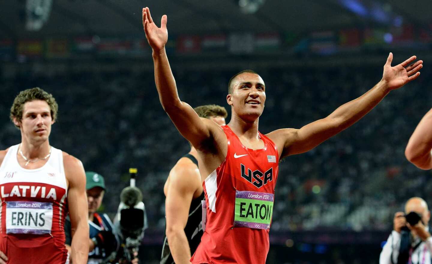 Ashton Eaton of the United States celebrates winning the gold medal in the men's decathlon Thursday.