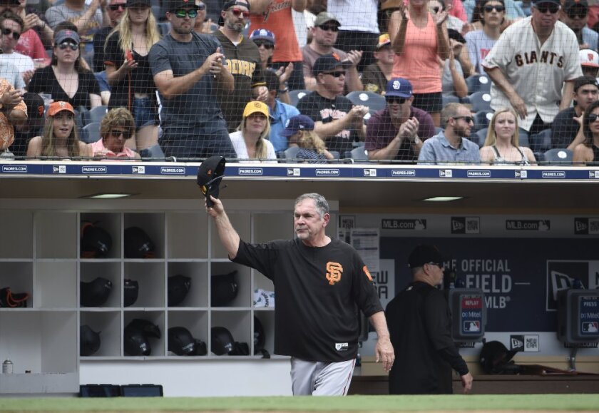 Bruce Bochy, who began his managerial career in San Diego in 1995, acknowledges the fans at Petco Park on Sunday.