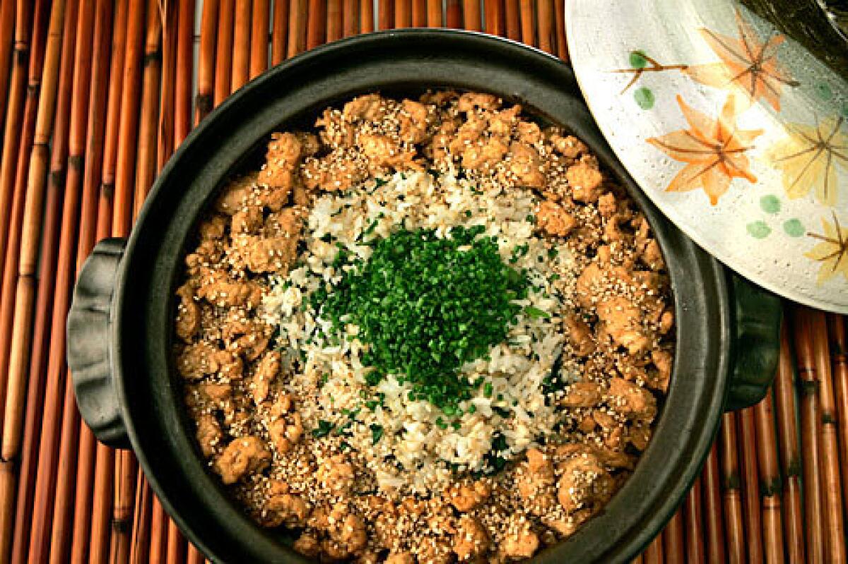 JAPANESE DISH: Rice with chicken and dandelion.