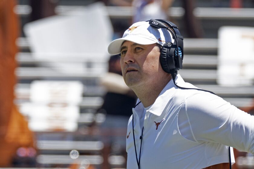 FILE - In this April 24, 2021, file photo, Texas head coach Steve Sarkisian watches his team during the final half of their spring NCAA college football game in Austin, Texas. (AP Photo/Michael Thomas, File)