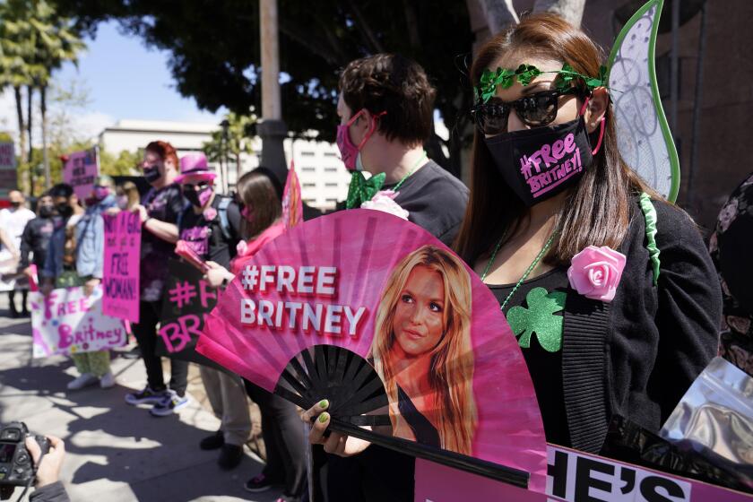 #freebritney protestors with signs by a courthouse