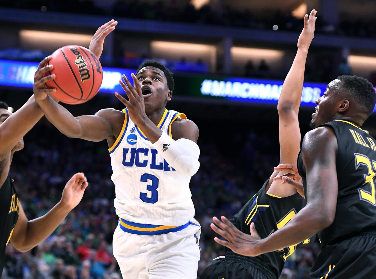 UCLA guard Aaron Holiday drives for a basket against Kent State during the second half.