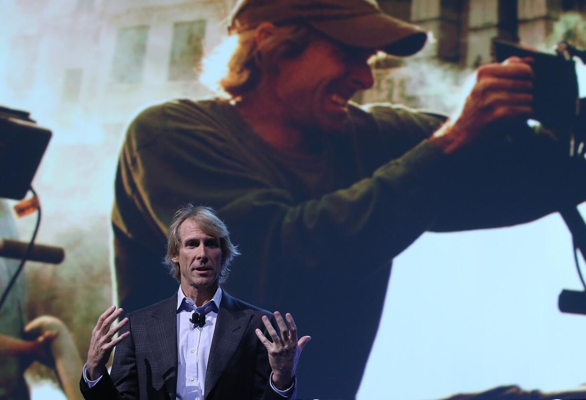 Michael Bay speaks at the Consumer Electronics Show moments before walking off the stage.