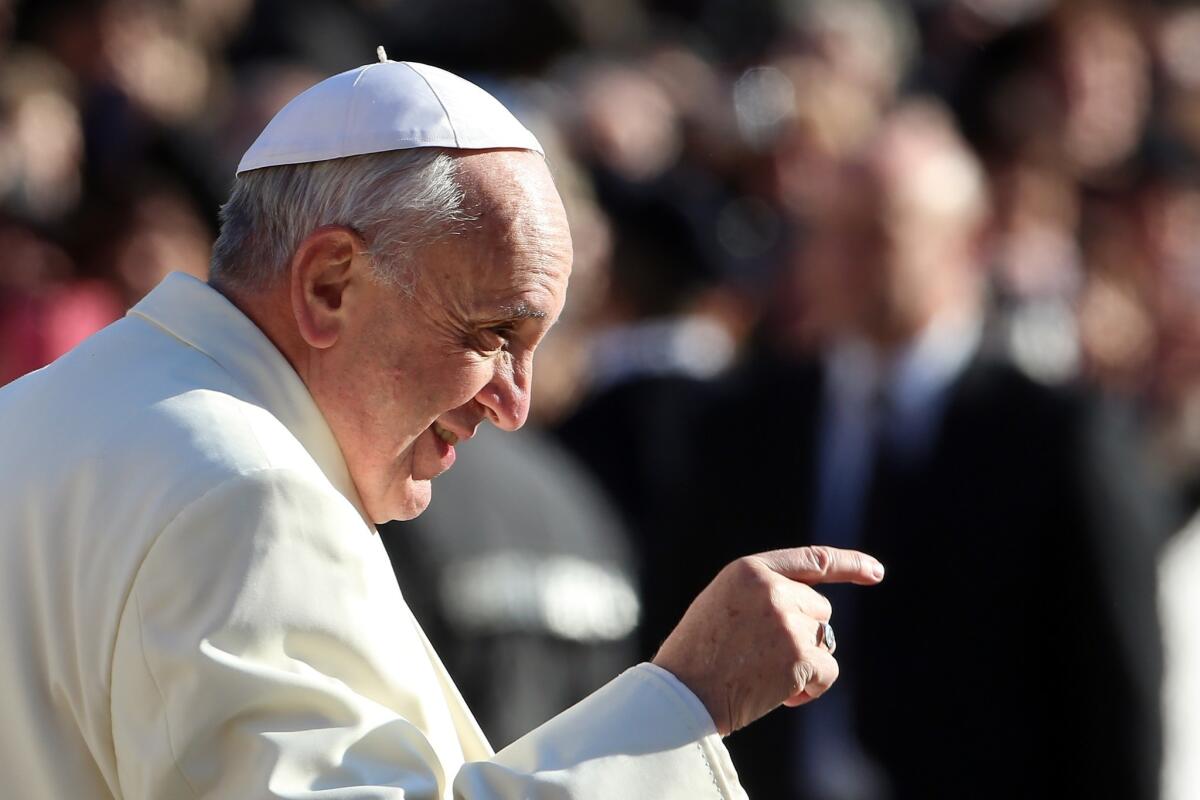 Pope Francis arrives in St. Peter's Square Wednesday for his weekly audience in Vatican City.