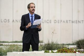 Los Angeles, CA - August 31: Los Angeles City Attorney Mike Feuer, who is running for mayor in 2022, in response to a Los Angeles Times story on police overtime, goes over his notes prior to a news conference in front of LAPD Headquarters on Tuesday, Aug. 31, 2021 in Los Angeles, CA. (Irfan Khan / Los Angeles Times)