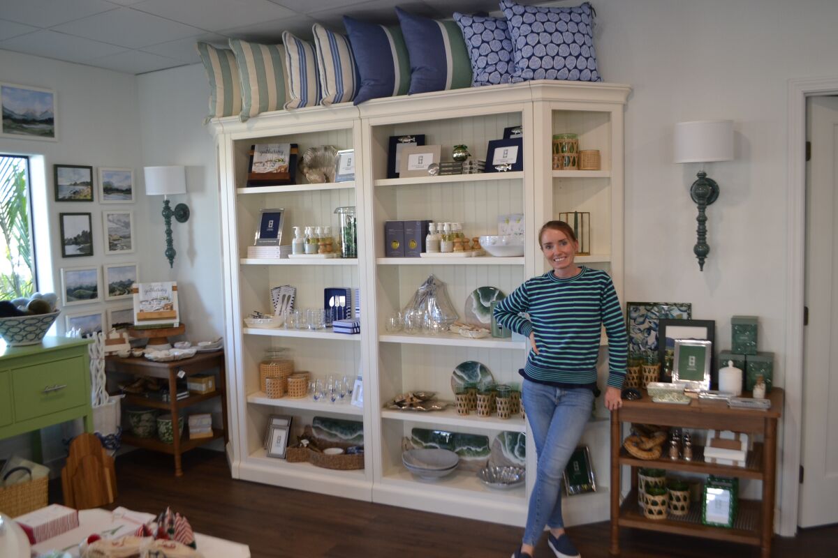 Elizabeth Betti stands in her store, Elizabeth Louise Interiors, on Poway Road.