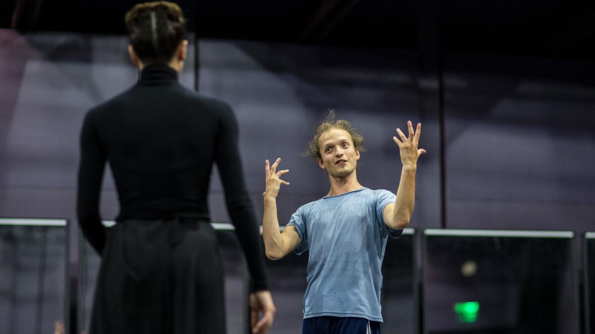 Choreographer Vladimir Varnava talks with Veronika Part at Segerstrom during rehearsal for "Isadora."