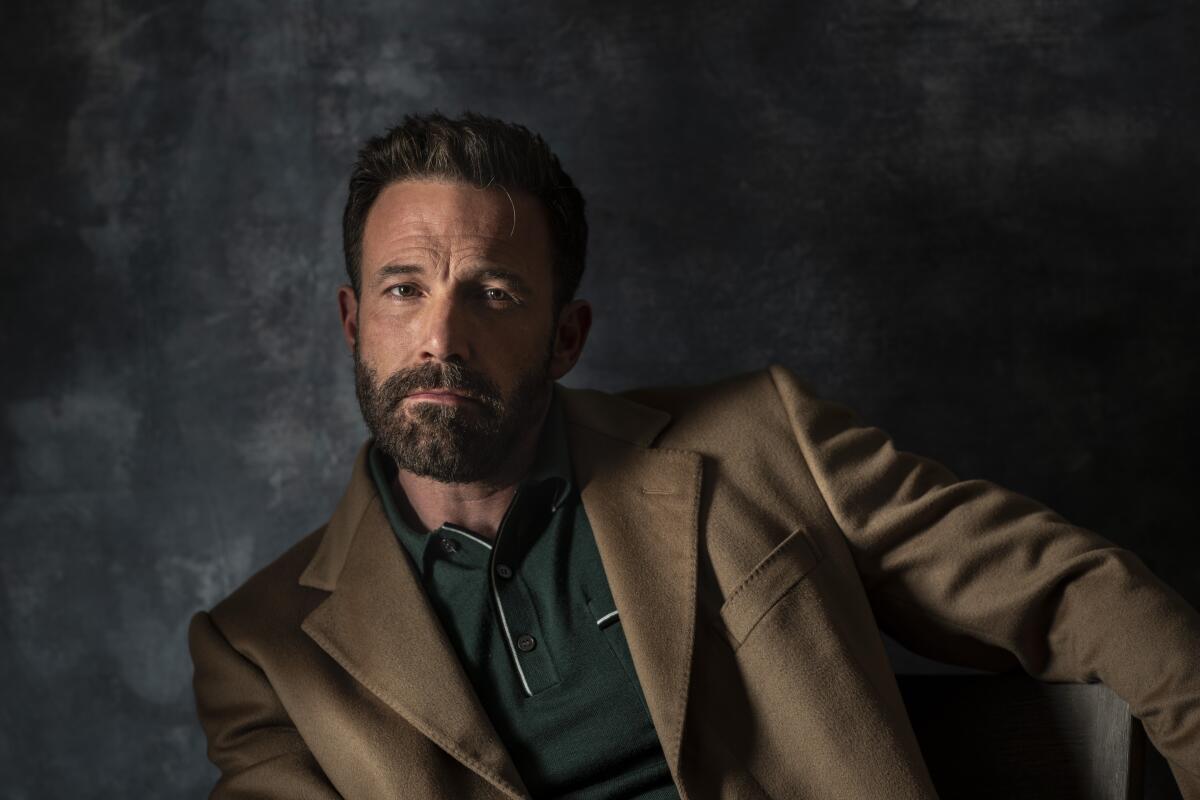 Ben Affleck leans to his right for a portrait.