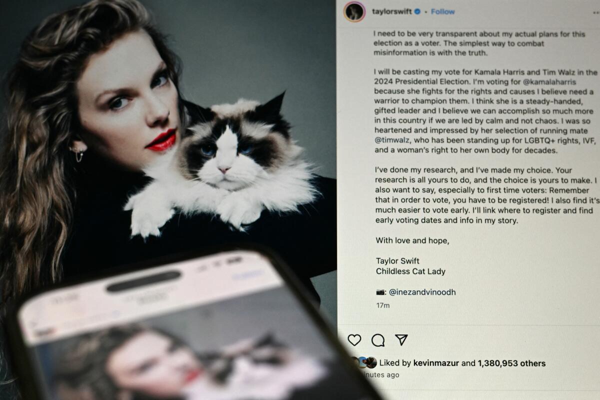 A smartphone and a larger screen show Taylor Swift holding a cat in an Instagram post