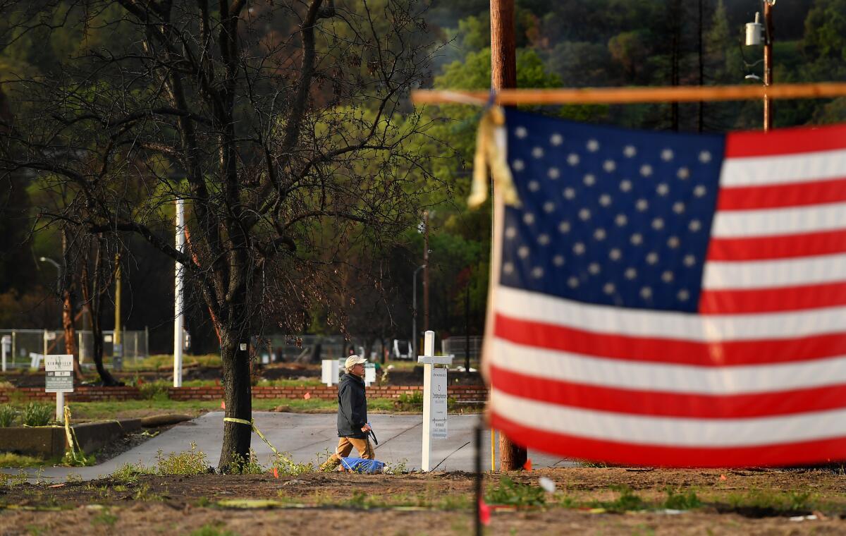 An American flags adorns an empty lot in the Mark West Estates neighborhood in Santa Rosa.