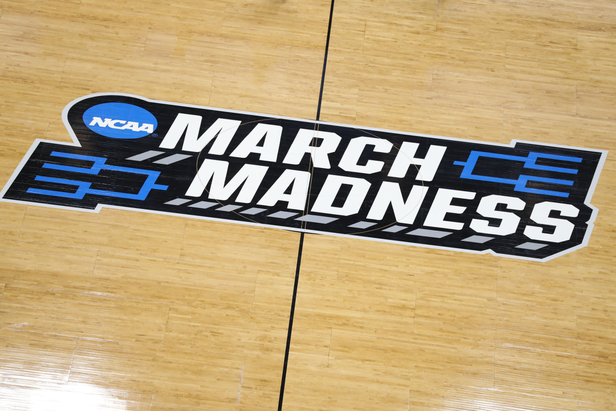 A view of a 'March Madness' logo is seen on a basketball court.