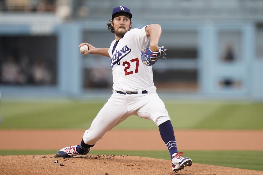 Dodgers starting pitcher Trevor Bauer pitches against the San Francisco Giants 