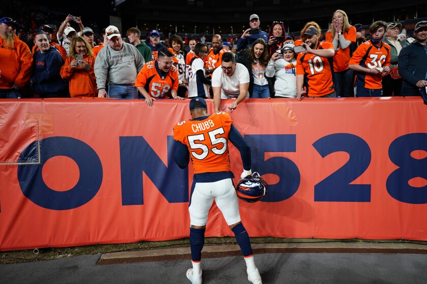 Denver Broncos outside linebacker Bradley Chubb (55) greets fans after an NFL football game against the Los Angeles Chargers, Sunday, Nov. 28, 2021, in Denver. (AP Photo/Jack Dempsey)