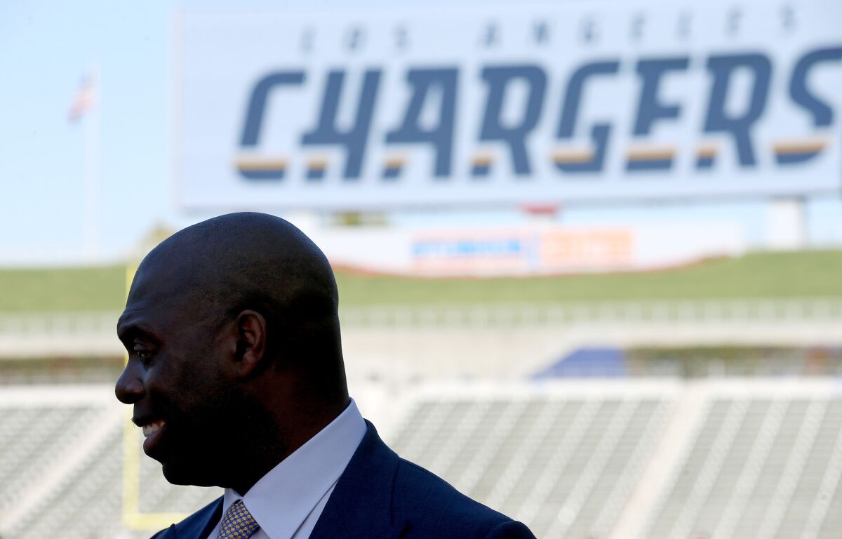 New Chargers Coach Anthony Lynn looks around StubHub Center in Carson following a news conference to announce his hiring on Jan. 17.