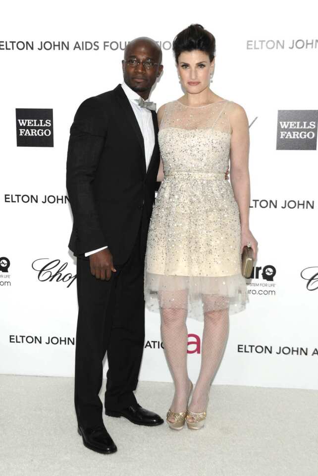 Actor Taye Diggs with wife Idina Menzel.