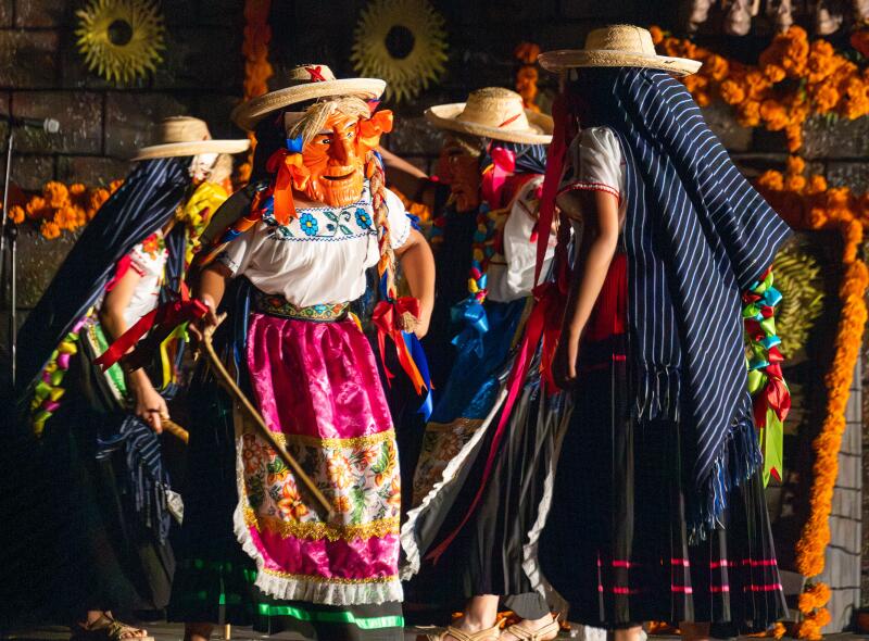 Performers dance