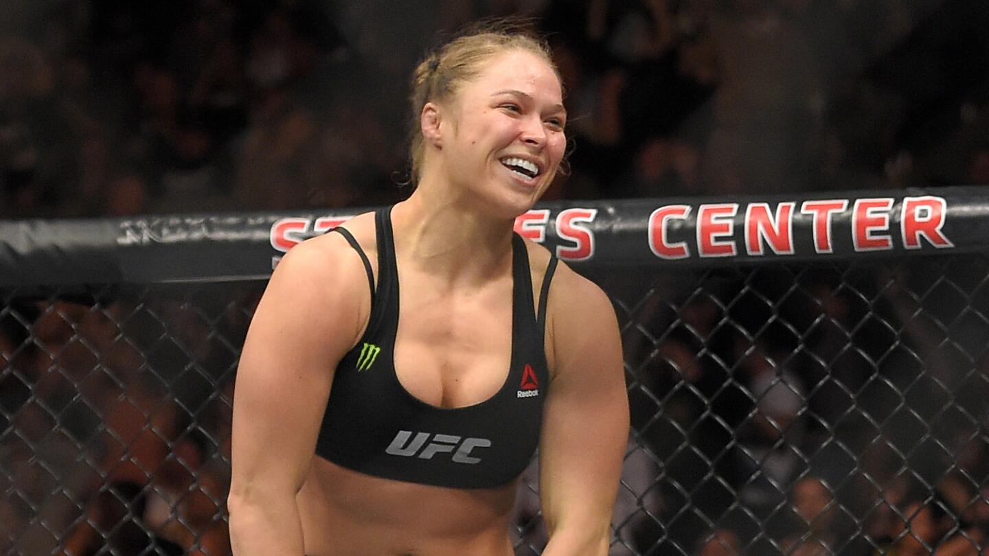 Ronda Rousey smiles after defeating Cat Zingano in a bantamweight title fight at UFC 184 in Los Angeles on Feb. 28.