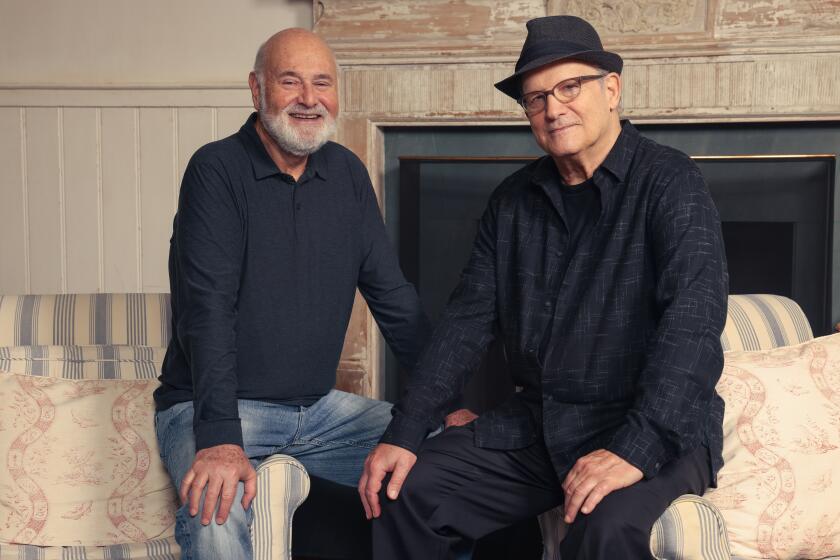 Los Angeles, CA - July 30: Rob Reiner and Albert Brooks, left and right, pose together as they have a new documentary out titled, "Albert Brooks: Defending My Life," in Brentwood on Tuesday, July 30, 2024 in Los Angeles, CA. The film is directed by Reiner and is about Brooks. (Dania Maxwell / Los Angeles Times)