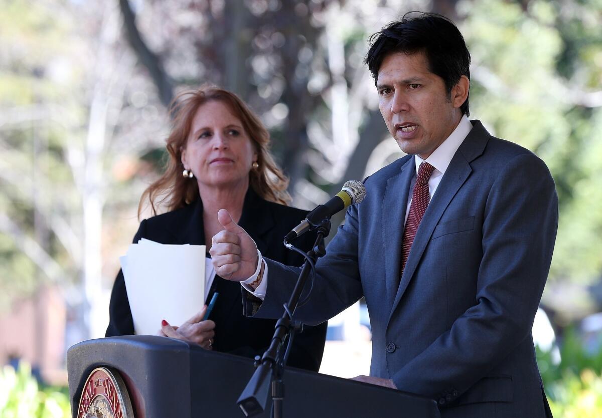 State Sen. Noreen Evans (D-Santa Rosa), left, looks on as state Sen. Kevin de Leon (D-Los Angeles) speaks during a news conference on guns last year. Evans is being replaced as chairwoman of the Judiciary Committee.