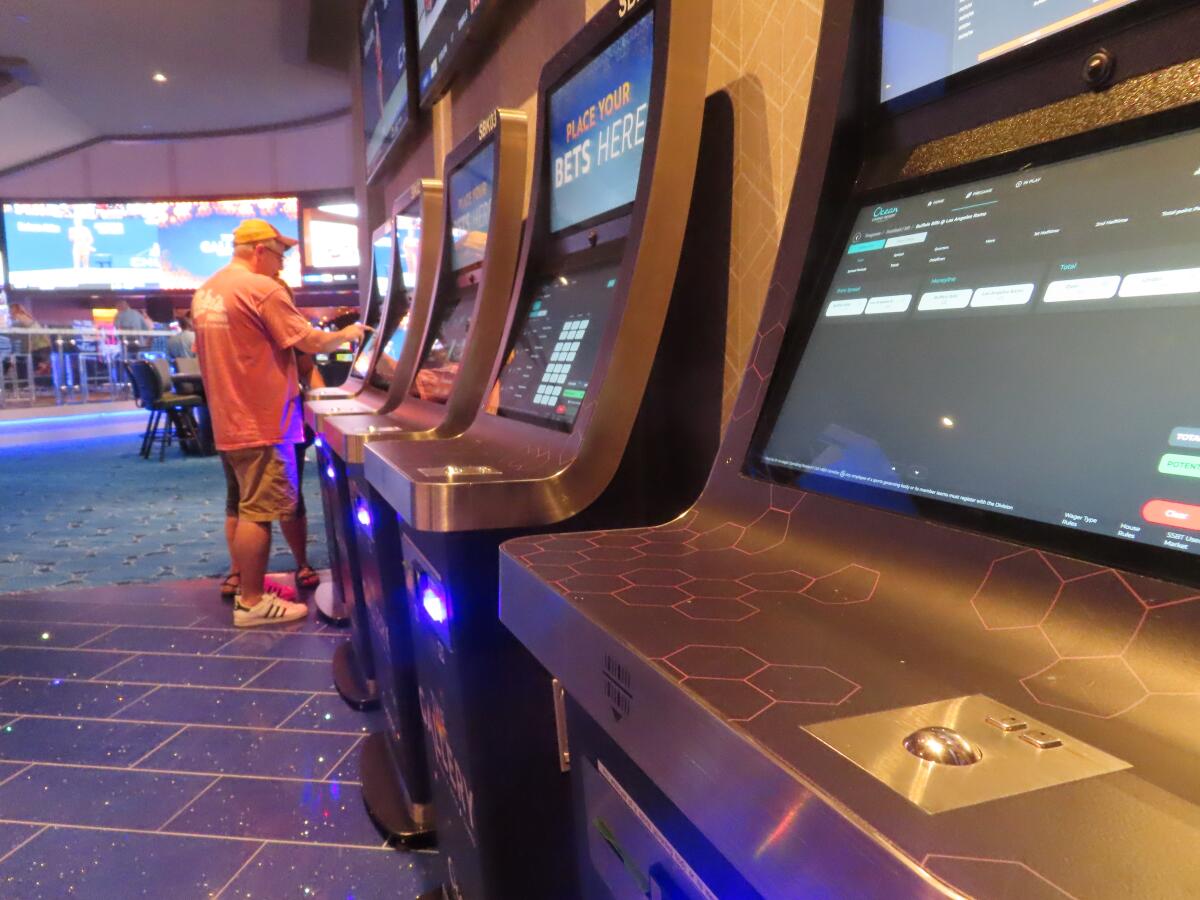 A gambler makes a sports bet at a casino in Atlantic City, N.J., in 2022.