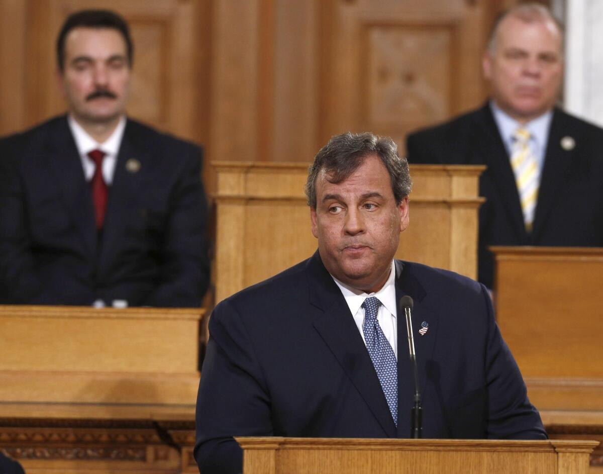 New Jersey Gov. Chris Christie, shown delivering his State of the State address Tuesday, told victims recovering from Hurricane Sandy on Thursday that "nothing will distract me from getting that job done."