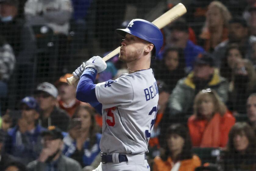 San Francisco, CA - October 09: Los Angeles Dodgers' Cody Bellinger follows through on a swing.