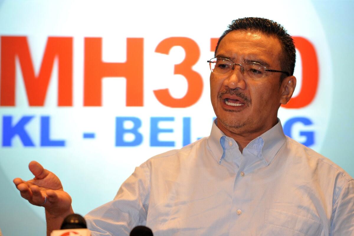 Malaysia's Minister of Defense and acting Minister of Transport Hishammuddin Hussein speaks at a press conference on Saturday in Kuala Lumpur.