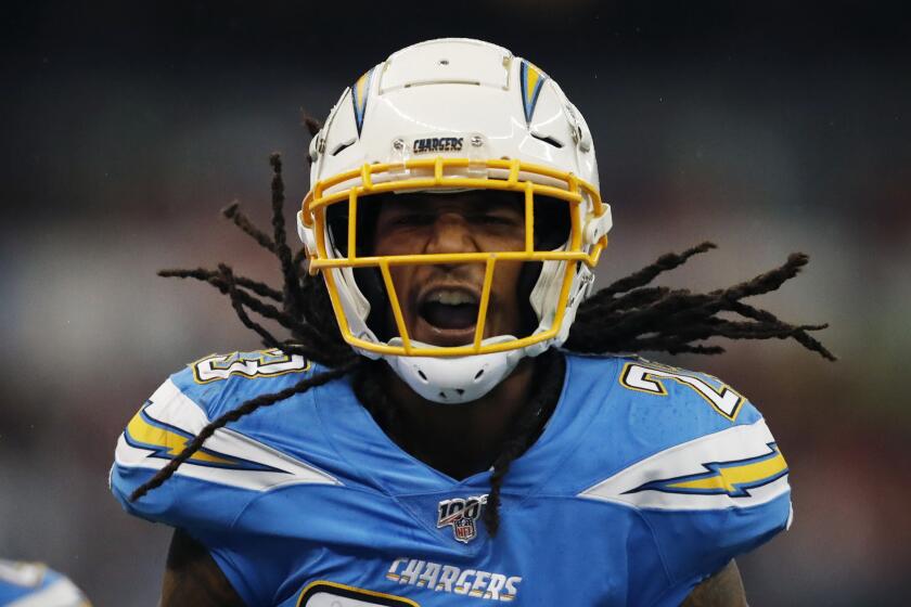 Los Angeles Chargers strong safety Rayshawn Jenkins celebrates his interception during the first half of an NFL football game against the Kansas City Chiefs, Monday, Nov. 18, 2019, in Mexico City. (AP Photo/Eduardo Verdugo)