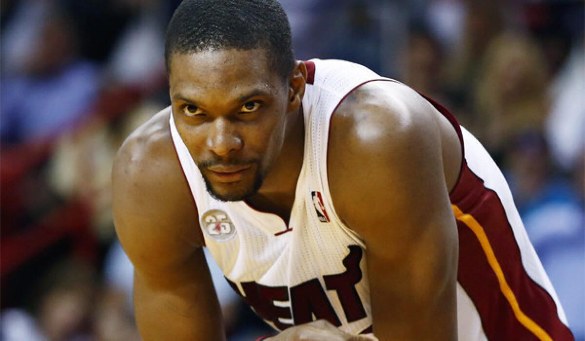 Miami's Chris Bosh may have had better weeks off the court, but he and the Heat remain The Times' No. 1 team.