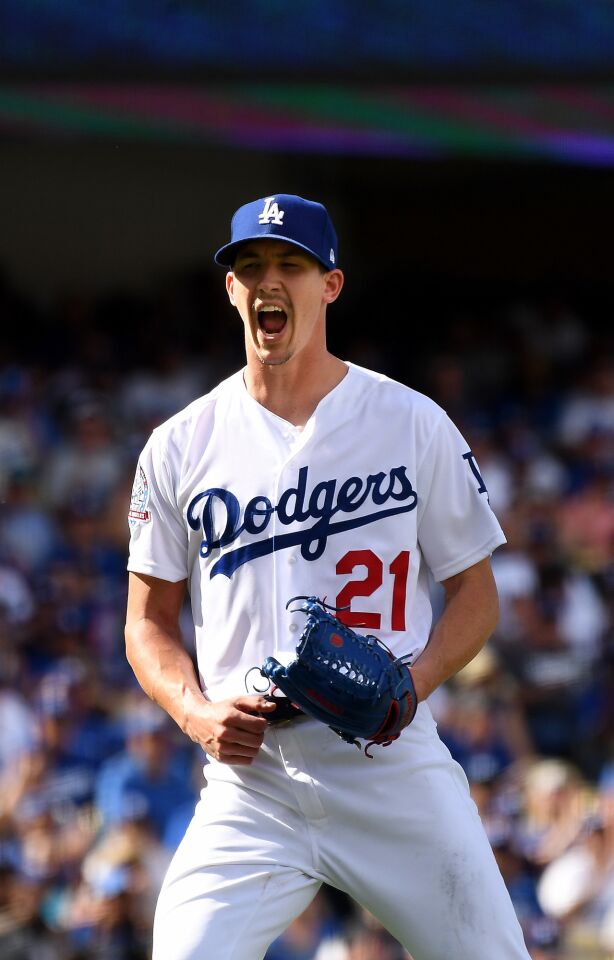 Dodgers pitcher Walker Buehler celebrates the last out of the sixth inning against the Rockies at Dodger Stadium.