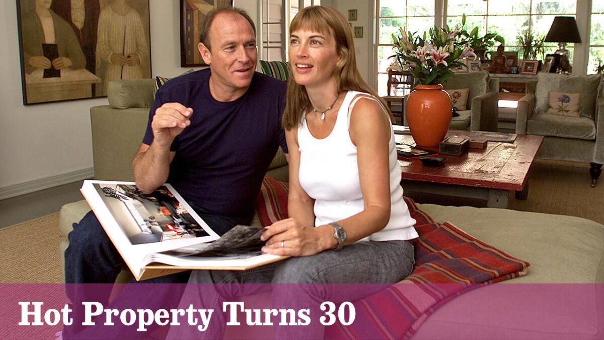 Corbin Bernsen and Amanda Pays in the living room of a home they renovated.