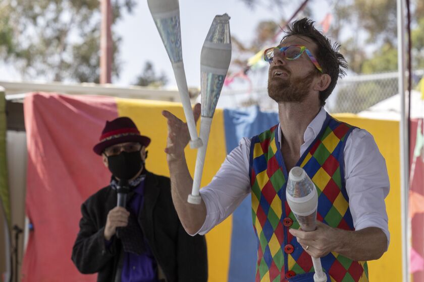 SAN DIEGO, CA - APRIL 09, 2022: A juggler who goes by Mr. Orbit performs during the Fern Street Circus show in City Heights, San Diego on Saturday, April 09, 2022. (Hayne Palmour IV / For The San Diego Union-Tribune)