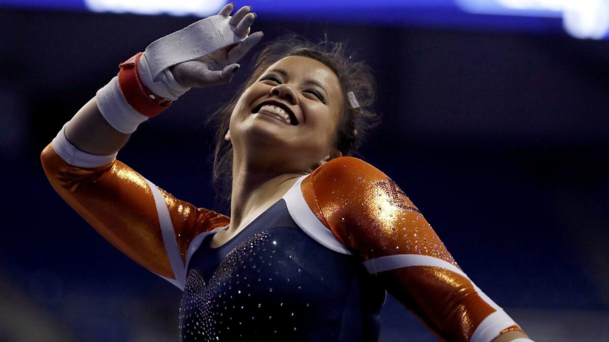 Auburn's Samantha Cerio smiles before competing at the NCAA women's gymnastics championships April 14, 2017, in St. Louis.